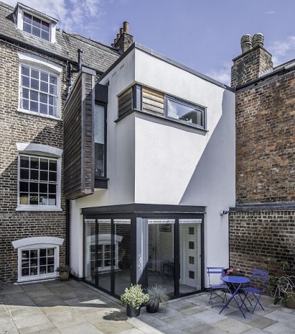 Modern extension to heritage crescent home